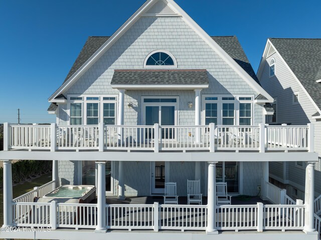 4316 Island Dr, North Topsail Beach, NC 28460 - back of house with a shingled roof and a balcony