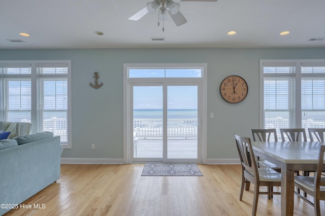 4316 Island Dr, North Topsail Beach, NC 28460 - dining room featuring baseboards, light wood finished floors, a ceiling fan, and recessed lighting
