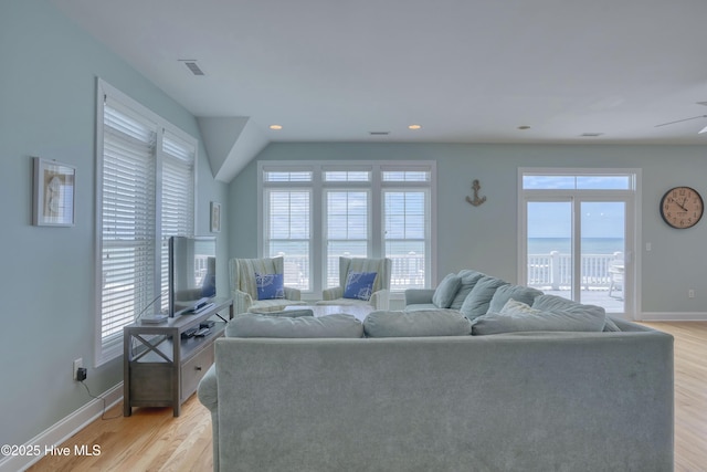 4316 Island Dr, North Topsail Beach, NC 28460 - living room with baseboards, light wood-style floors, and recessed lighting