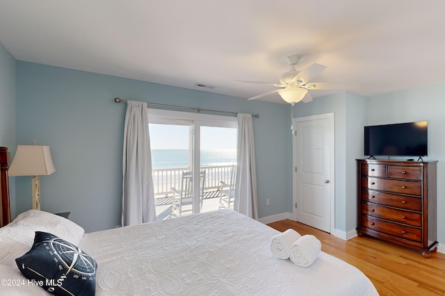 bedroom featuring access to exterior, ceiling fan, and hardwood / wood-style floors