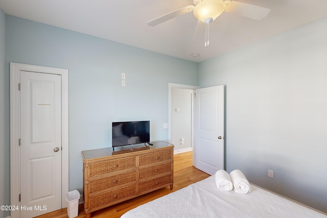 4316 Island Dr, North Topsail Beach, NC 28460 - bedroom featuring light wood-style flooring and a ceiling fan