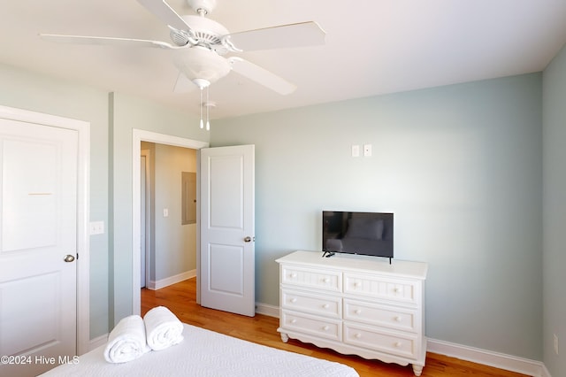 bedroom featuring ceiling fan and light hardwood / wood-style floors