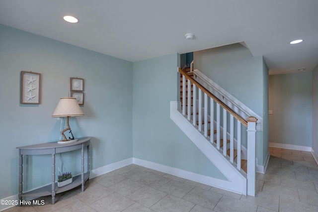 4316 Island Dr, North Topsail Beach, NC 28460 - stairway featuring recessed lighting, baseboards, and tile patterned floors