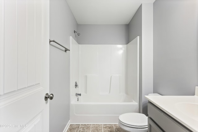 full bathroom featuring toilet, vanity, and shower / bathing tub combination