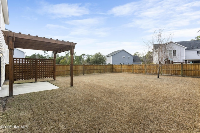 view of yard with a patio area and a pergola