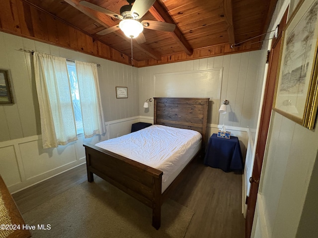 bedroom with dark hardwood / wood-style floors, ceiling fan, wood ceiling, and lofted ceiling with beams