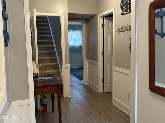 hallway featuring dark hardwood / wood-style flooring