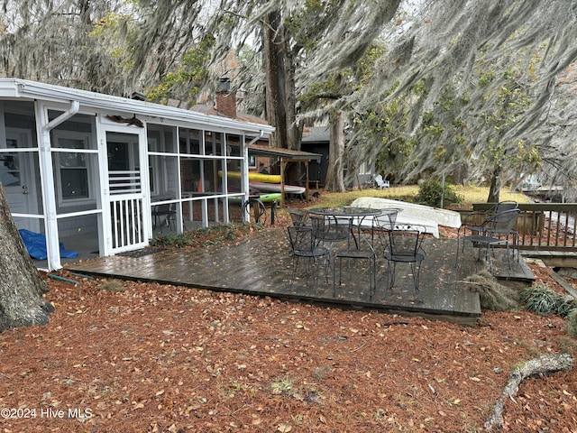 deck featuring a sunroom