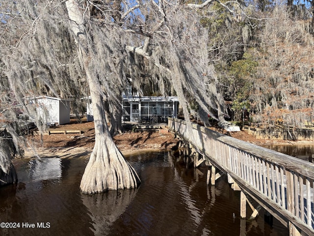 dock area featuring a water view