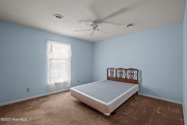 bedroom featuring baseboards, visible vents, and carpet flooring