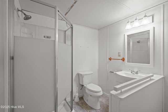 full bathroom with toilet, a stall shower, visible vents, and vanity