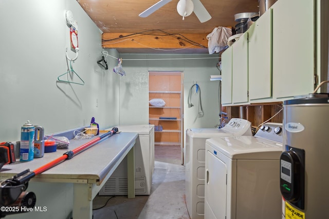 washroom featuring washing machine and dryer, water heater, ceiling fan, and cabinet space