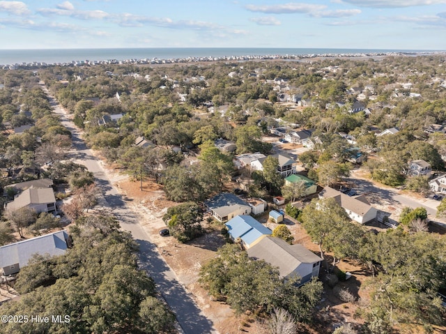 birds eye view of property featuring a water view and a residential view