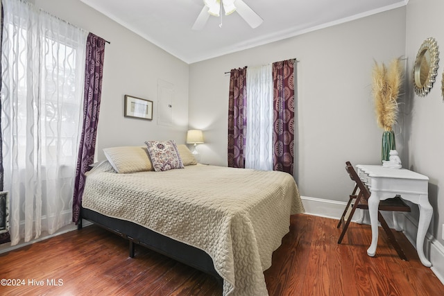 bedroom featuring hardwood / wood-style floors and ceiling fan