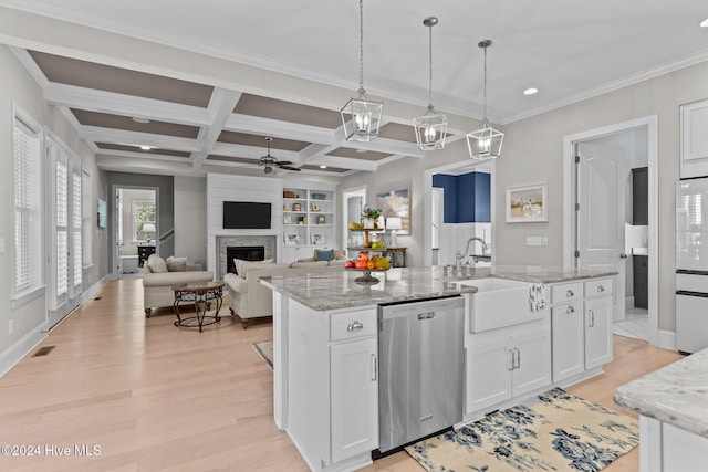 kitchen featuring white cabinetry, dishwasher, and coffered ceiling