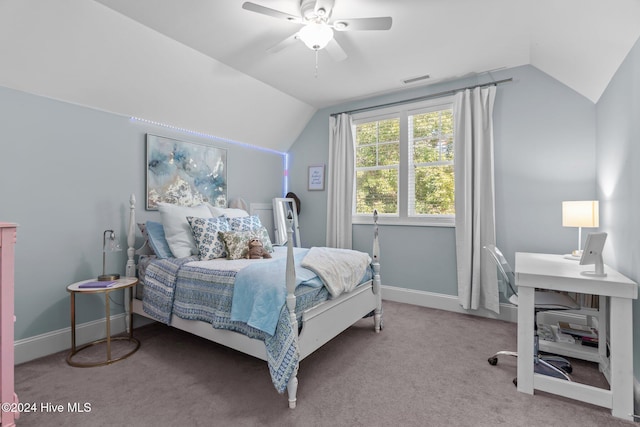 bedroom with carpet flooring, ceiling fan, and vaulted ceiling