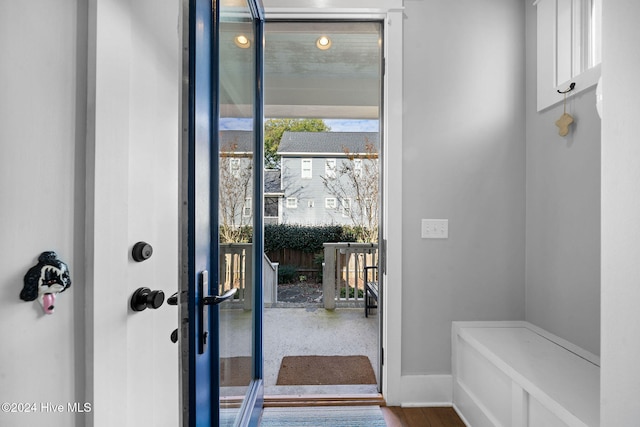 doorway with wood-type flooring