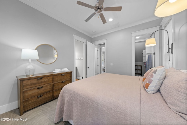 bedroom with ceiling fan, light carpet, and ornamental molding