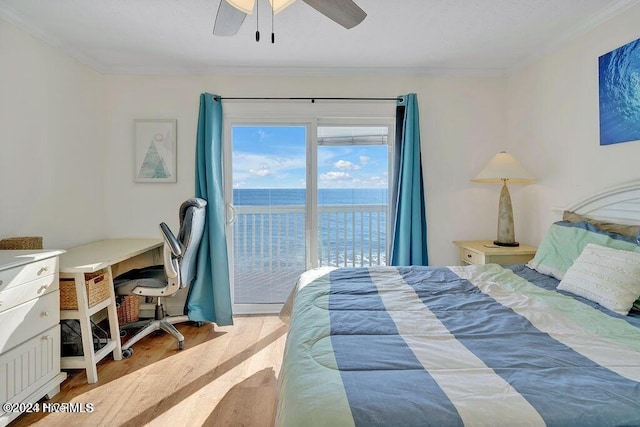 bedroom with ceiling fan, crown molding, light hardwood / wood-style floors, access to outside, and a water view