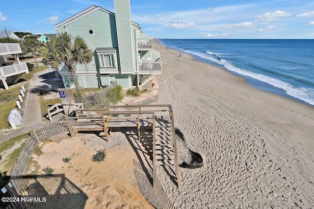 view of water feature with a beach view