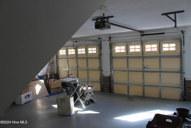 garage featuring a garage door opener