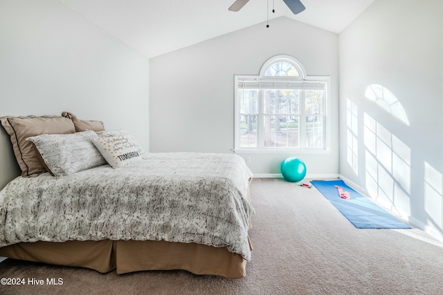 bedroom featuring carpet, ceiling fan, and vaulted ceiling