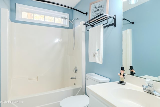 full bathroom featuring vanity, toilet, and tub / shower combination