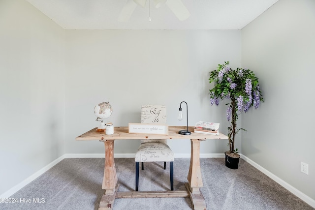 carpeted office with ceiling fan