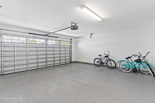 garage featuring a garage door opener