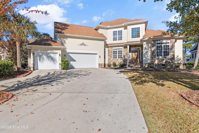 view of front of property with a garage