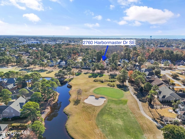 bird's eye view featuring a residential view, a water view, and view of golf course