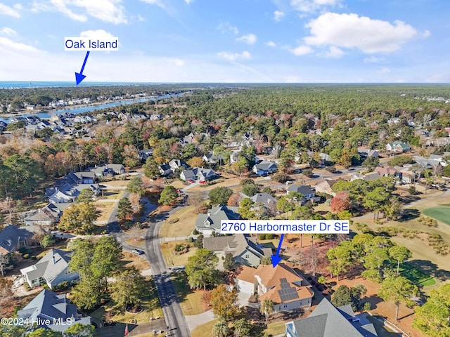 aerial view featuring a residential view and a water view