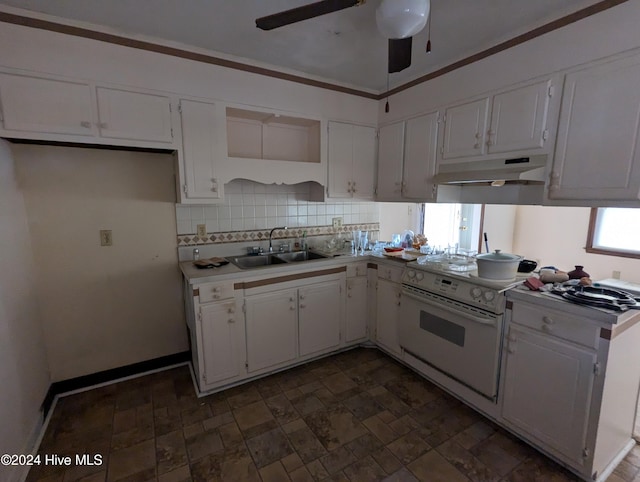 kitchen with white cabinets, white range with electric stovetop, and sink