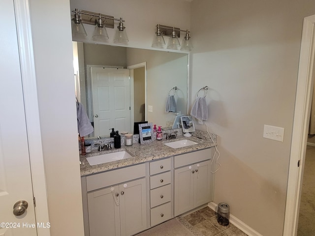 bathroom with vanity and tile patterned floors