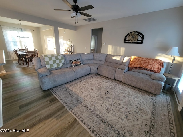 living room with hardwood / wood-style floors and ceiling fan