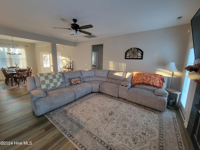 living room with hardwood / wood-style floors and ceiling fan