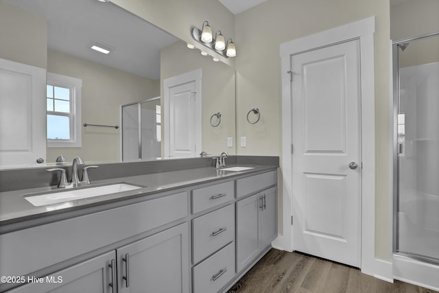 116 Talbert Dr, Rocky Point, NC 28457 - full bathroom featuring a shower stall, double vanity, and wood finished floors