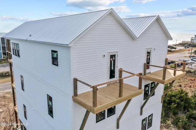 view of home's exterior featuring a balcony