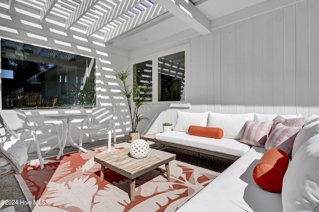 view of patio featuring a pergola and outdoor lounge area