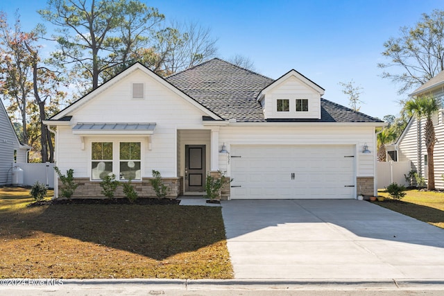 view of front of property featuring a garage