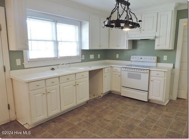 kitchen featuring white cabinets, pendant lighting, range with electric cooktop, and sink