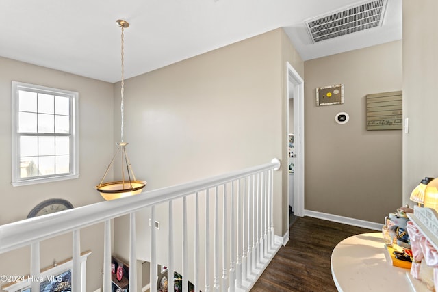 hall with dark hardwood / wood-style floors