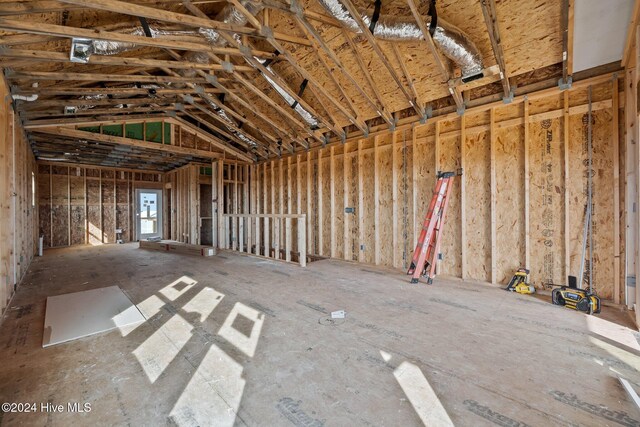 misc room featuring lofted ceiling