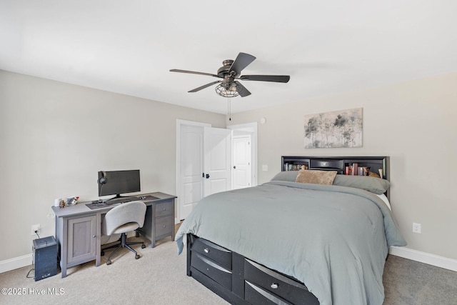bedroom featuring a ceiling fan, baseboards, and light colored carpet