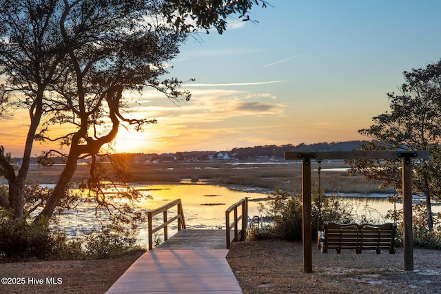 view of home's community with a water view