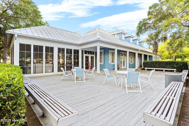 exterior space with french doors and outdoor dining space