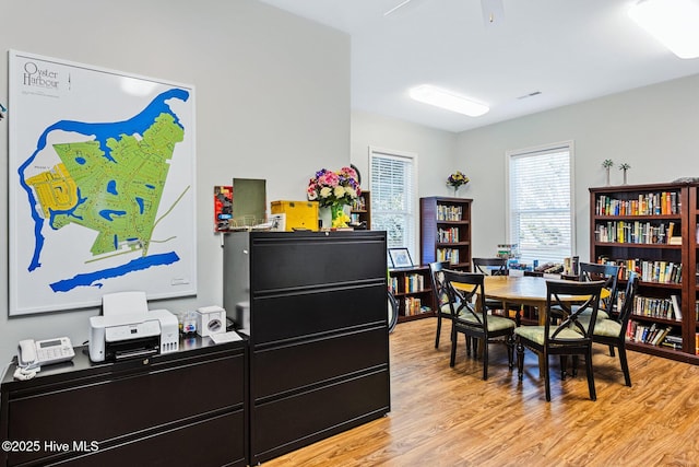 dining area with light hardwood / wood-style flooring