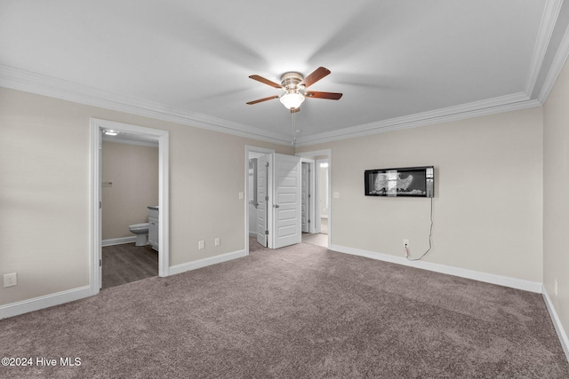 unfurnished bedroom with carpet floors, ensuite bathroom, crown molding, and ceiling fan