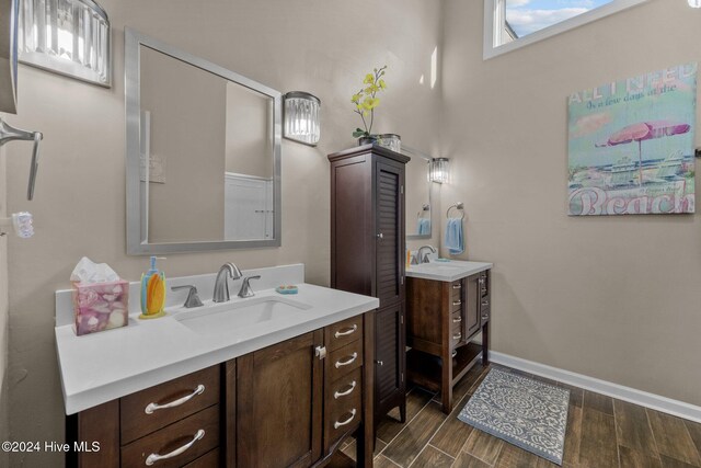 bathroom featuring hardwood / wood-style flooring and vanity