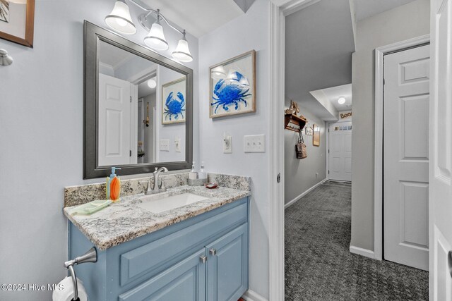 washroom featuring light colored carpet and washing machine and dryer